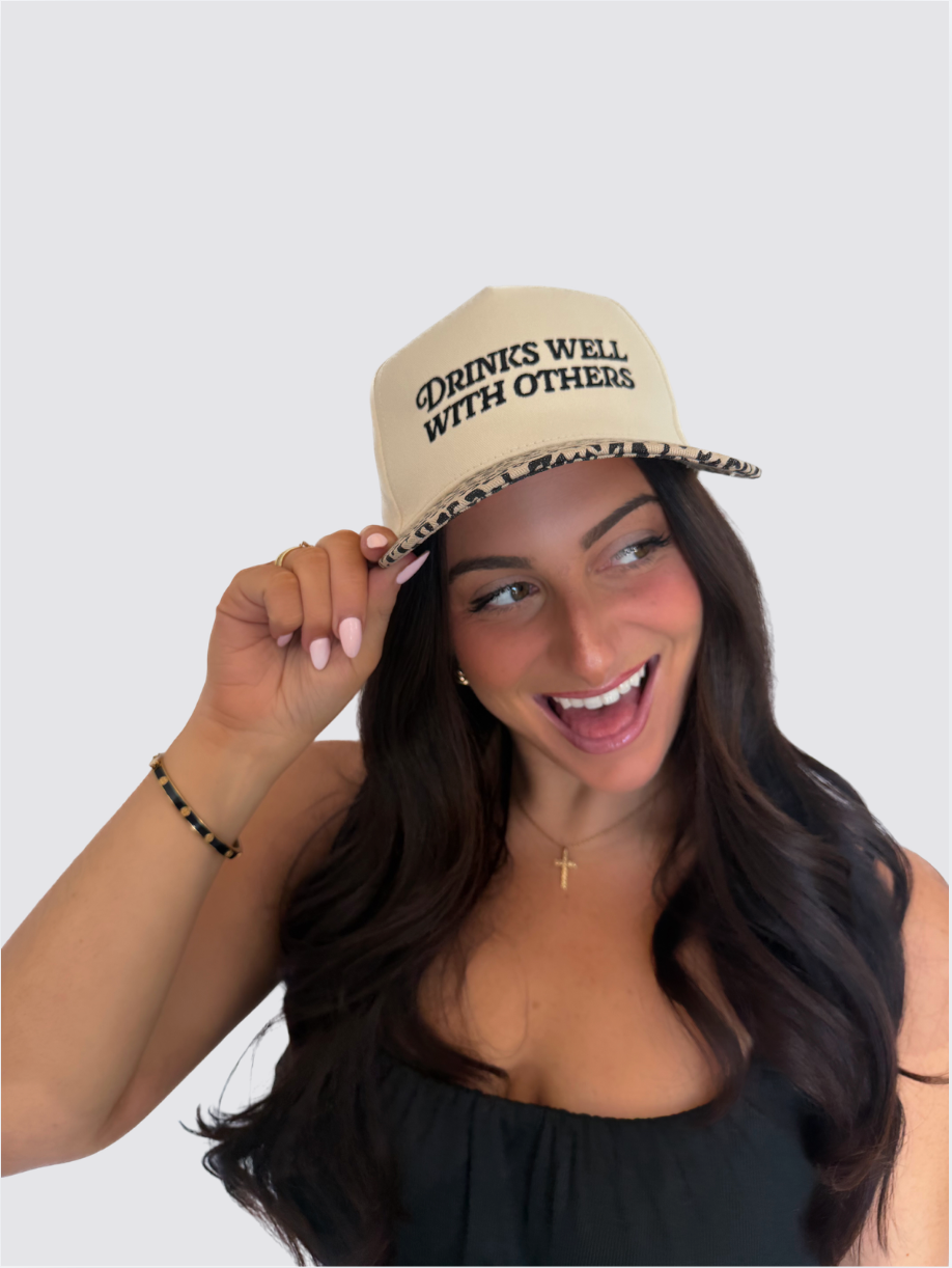 Drinks Well With Others Trucker Hat